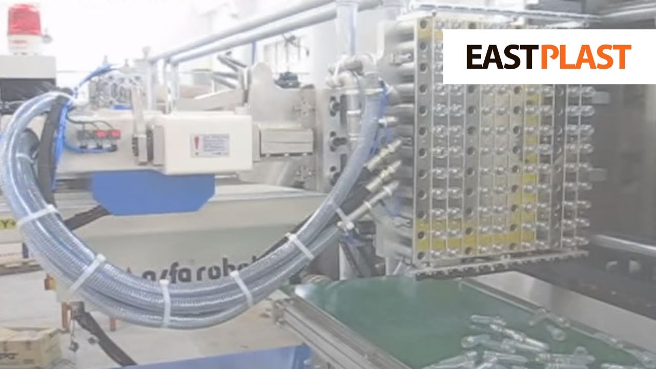 Выемка ПЭТ-преформ из пресс-формы с помощью робота манипулятора Alfa Robot